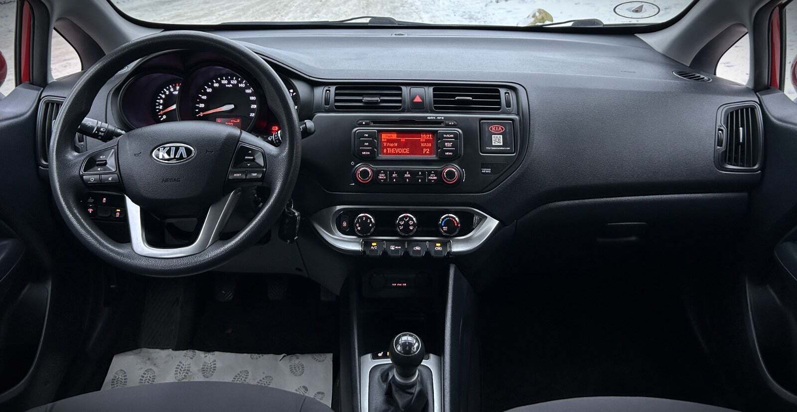 Grå Kia Rio fra 2013