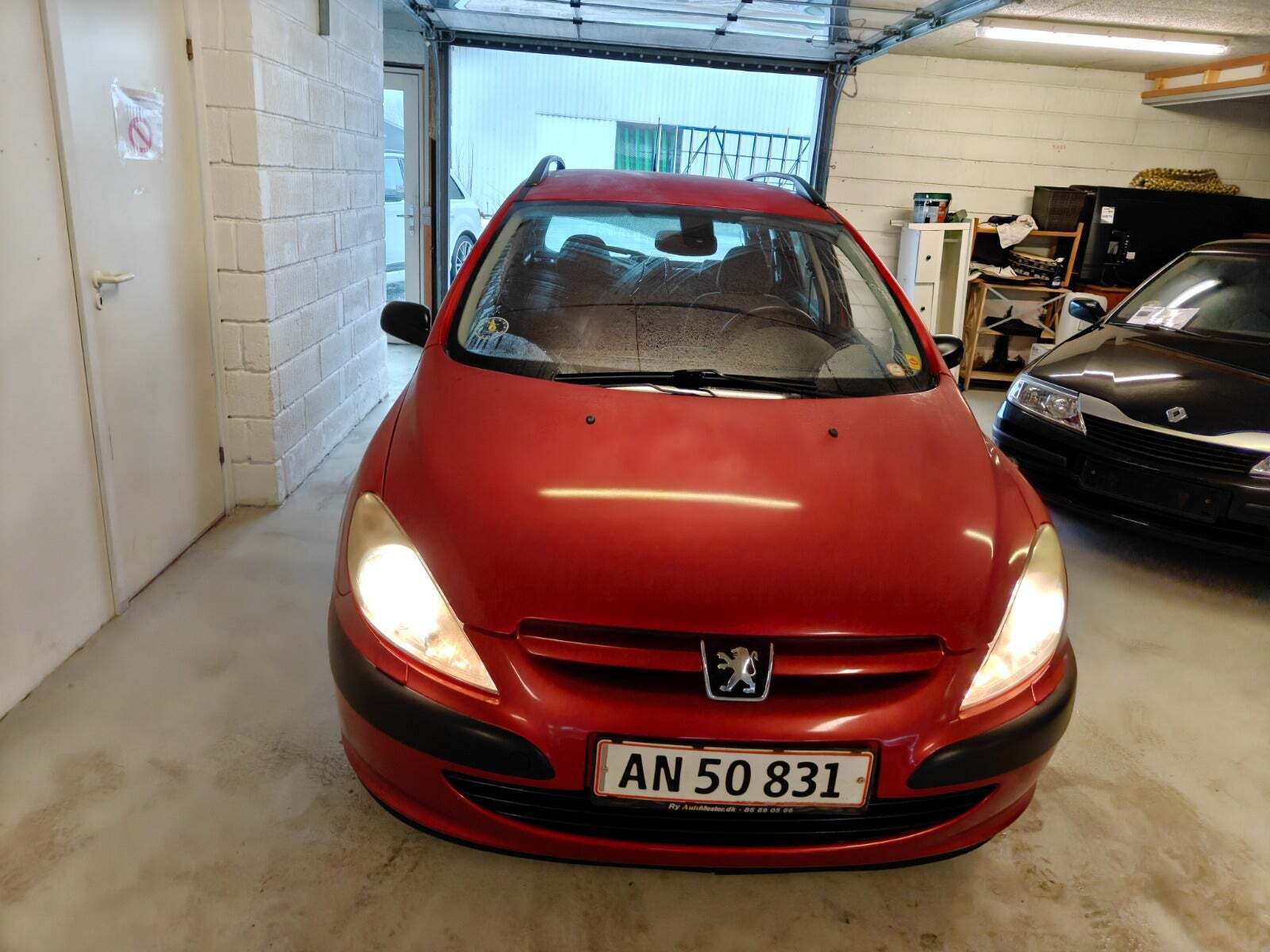 Gul Peugeot 307 fra 2004
