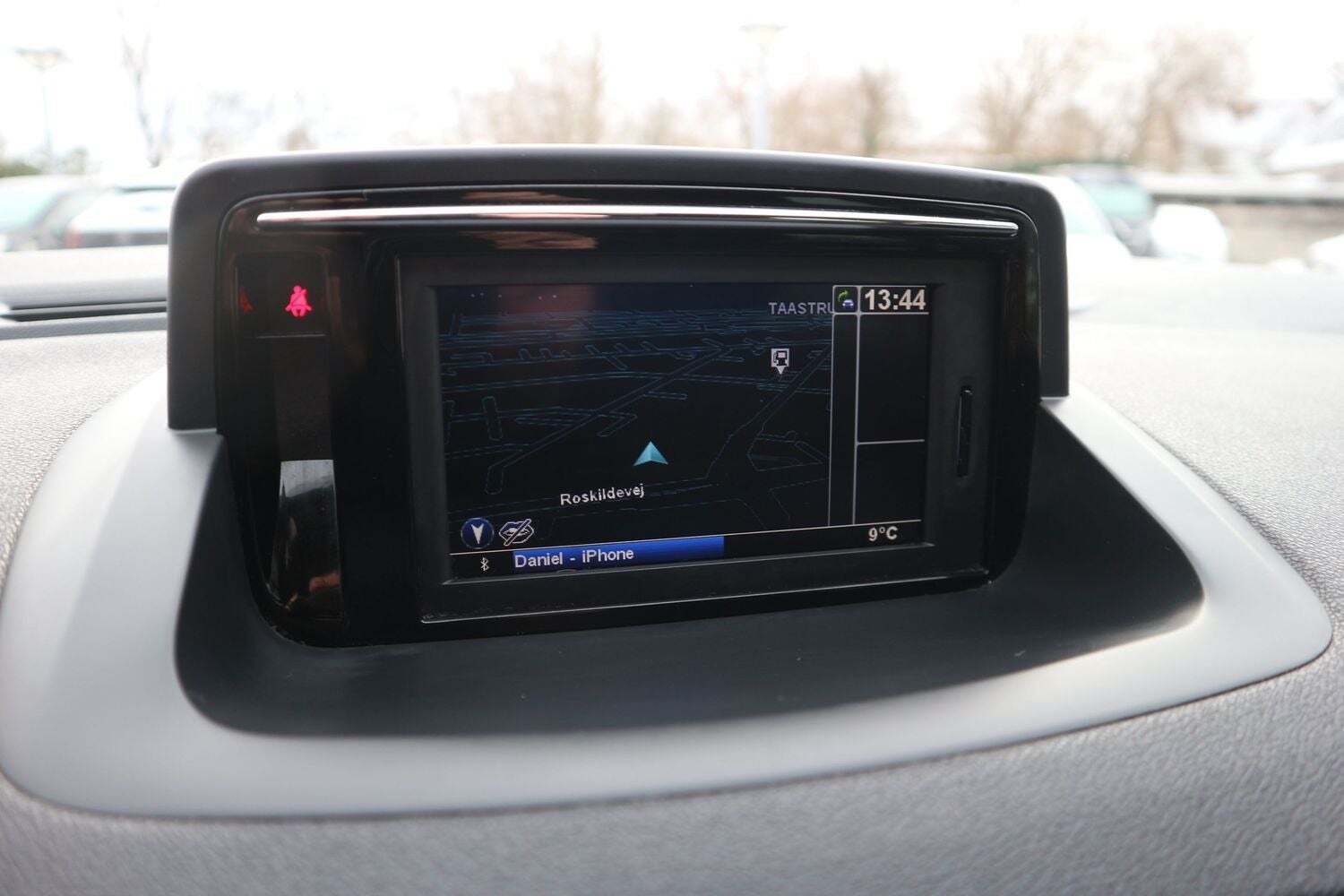 Rød Renault Megane III fra 2012