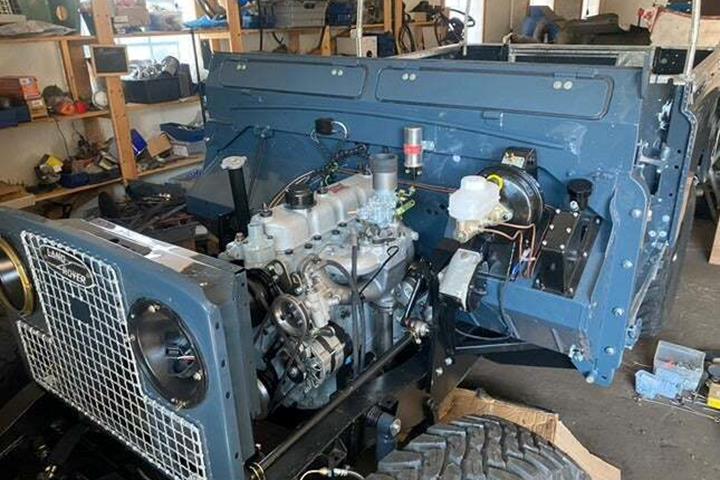 Gul Land Rover Serie II fra 1958 set udefra