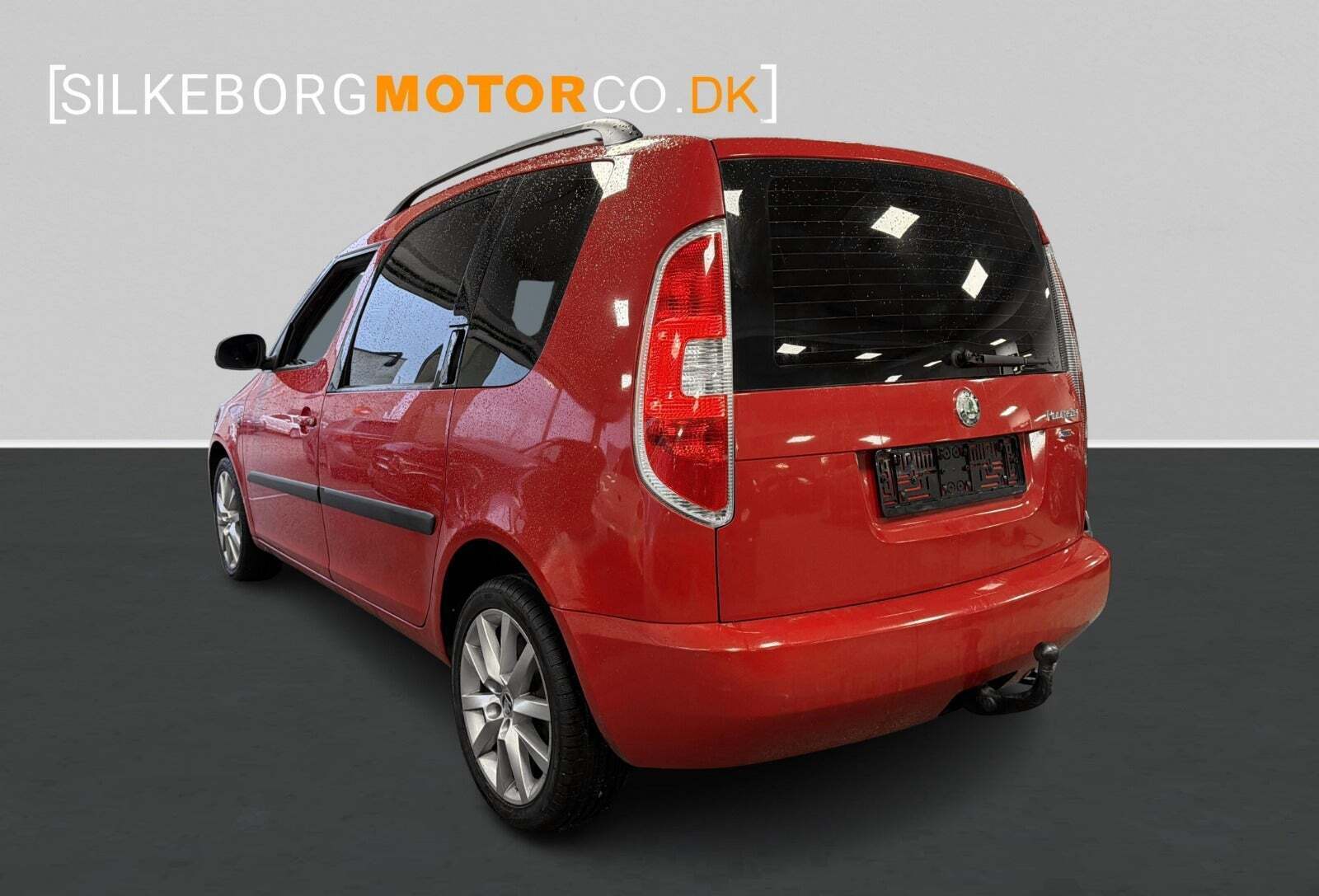 Rød Skoda Roomster fra 2007