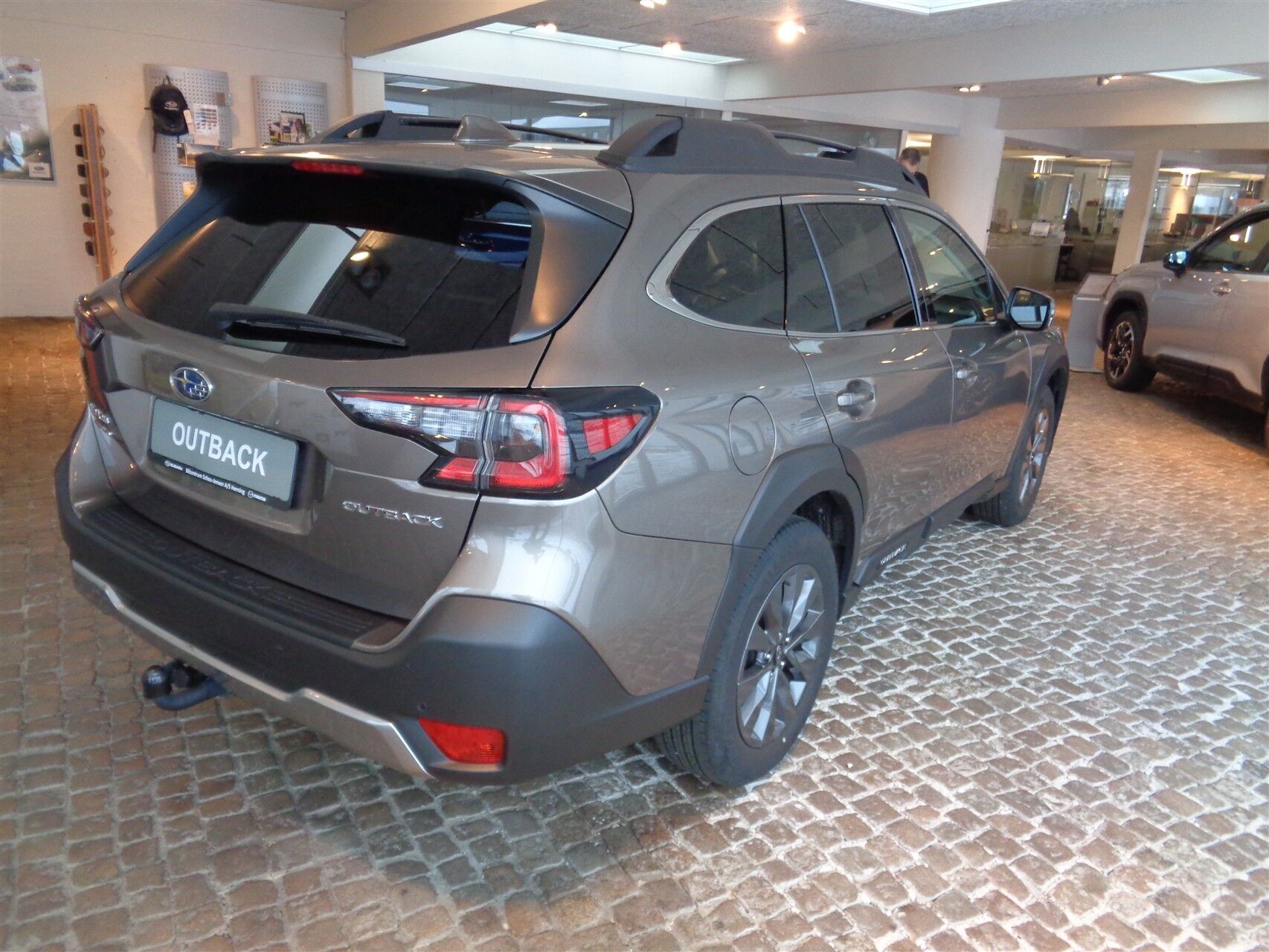 Bronze Subaru Outback fra 2024