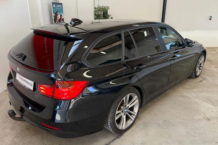 Sort BMW 318d fra 2013