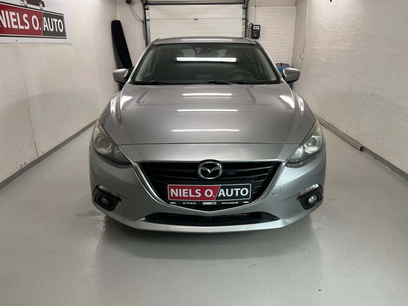 Sølv Mazda 3 fra 2013