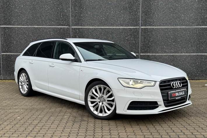 Hvid Audi A6 fra 2013 set udefra