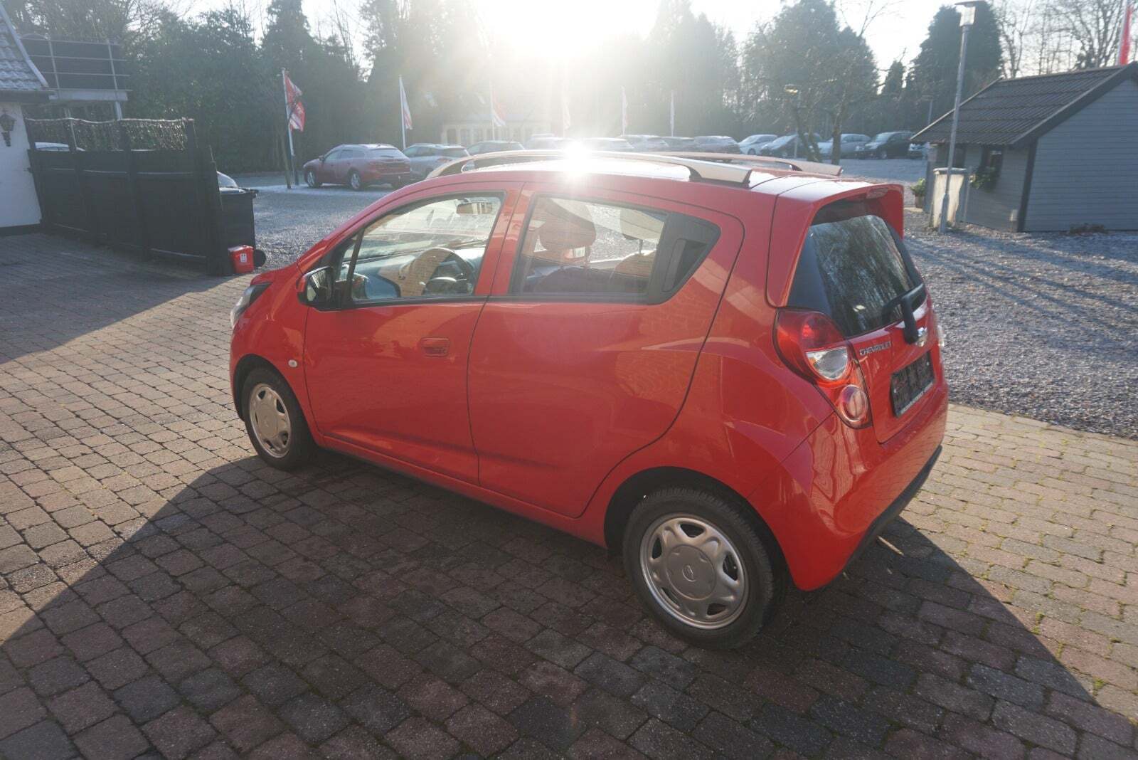 Rød Chevrolet Spark fra 2013