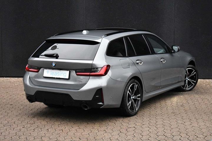 Grå BMW 320i fra 2023