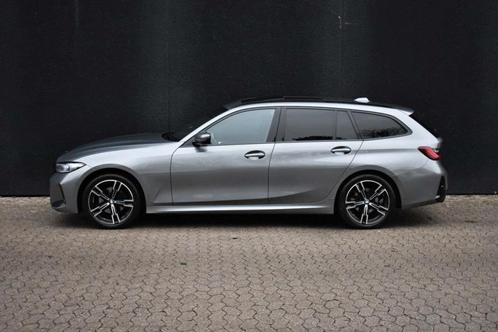 Grå BMW 320i fra 2023