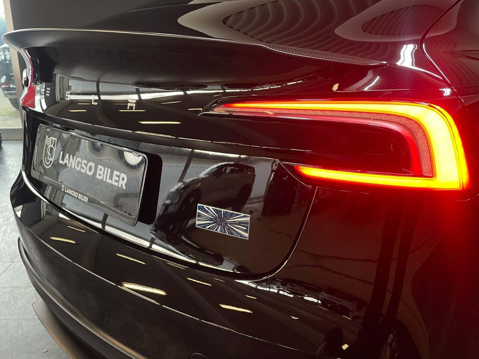 Sort Tesla Model 3 fra 2024