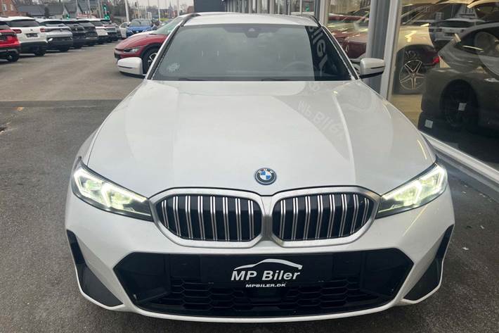 Hvid BMW 320e fra 2024