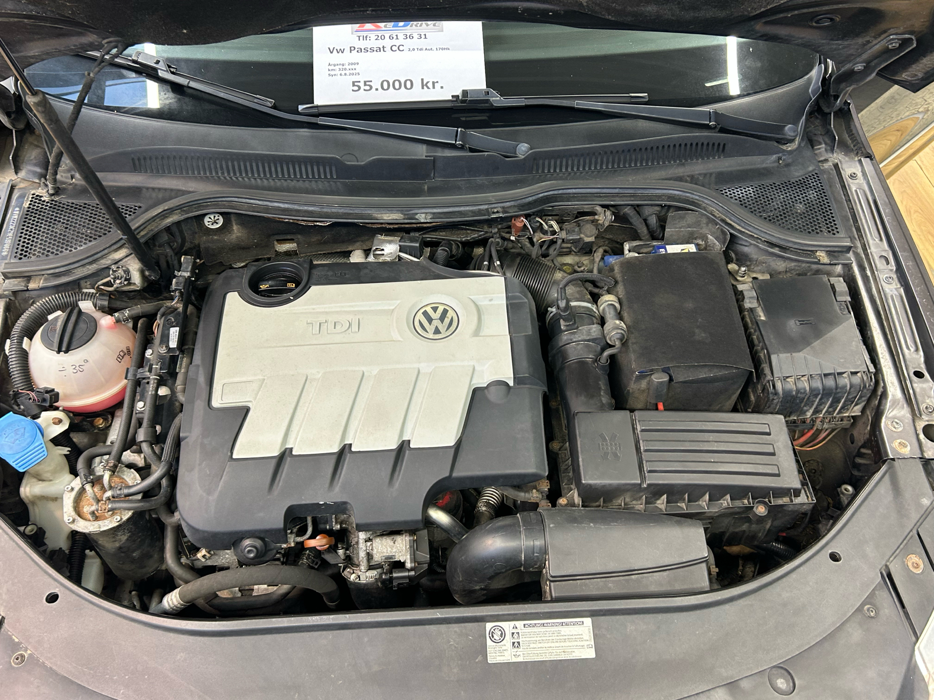 Sort VW Passat fra 2009