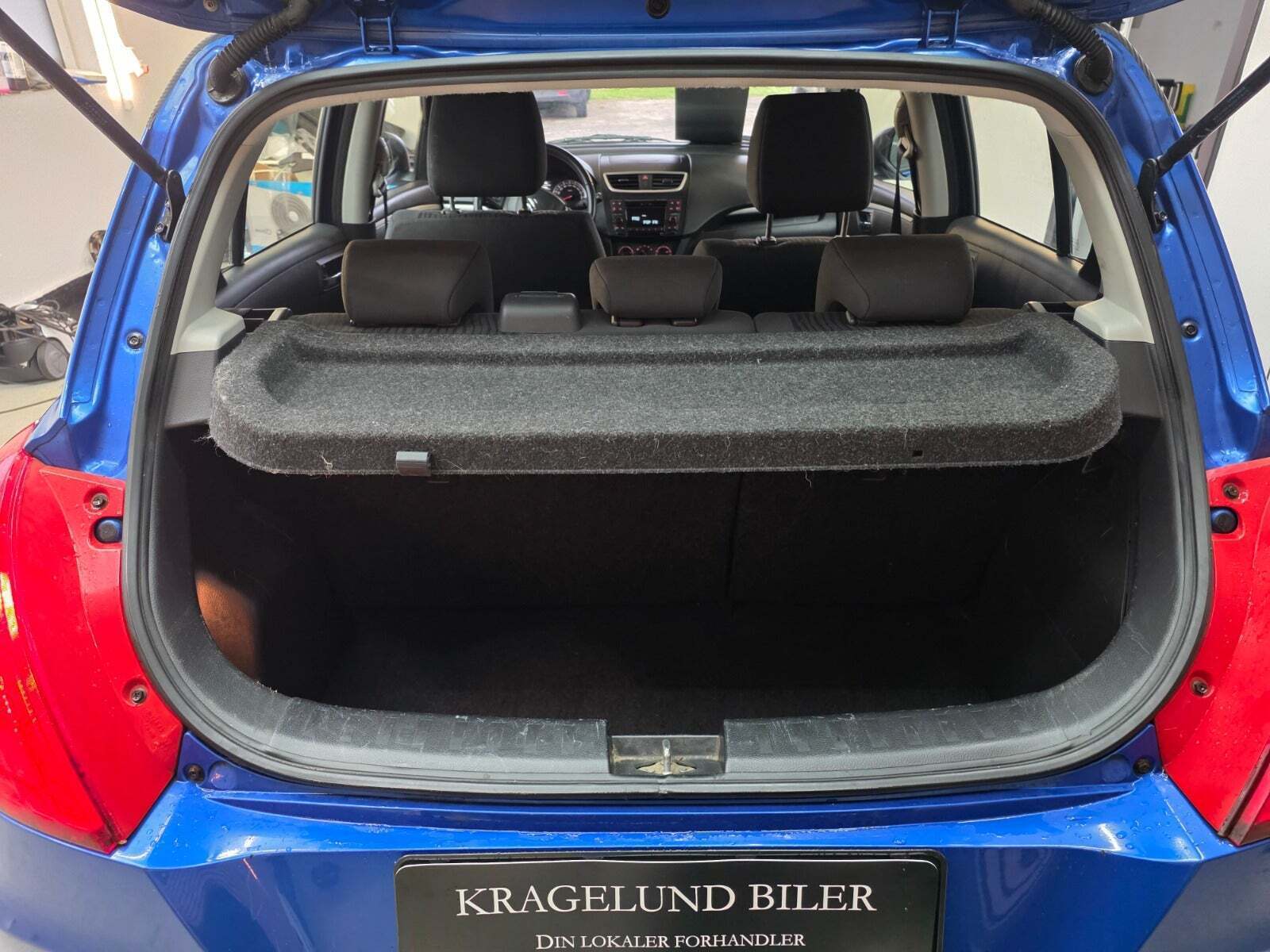 Grøn Suzuki Swift fra 2012