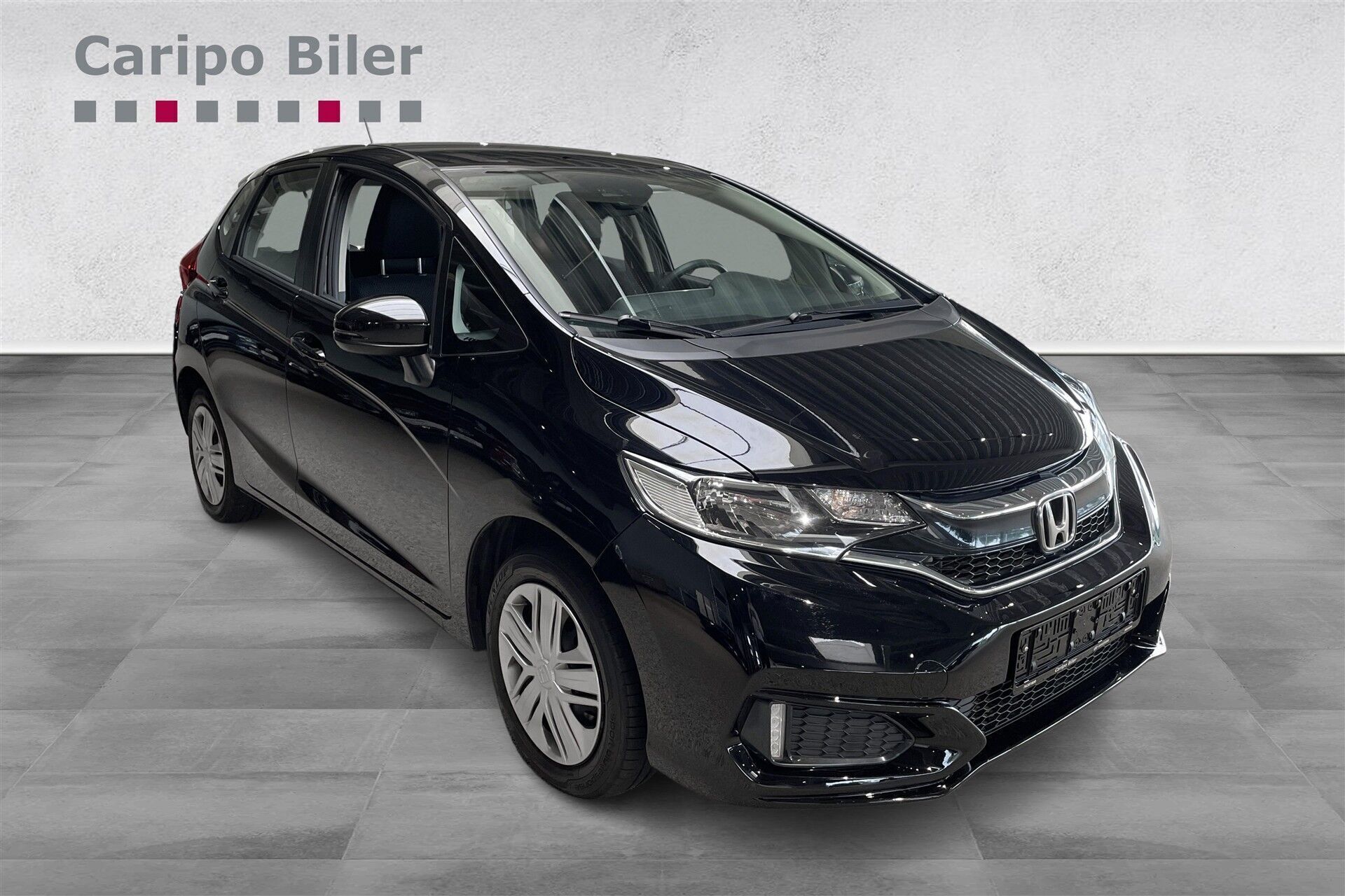 Sort Honda Jazz fra 2019 set udefra