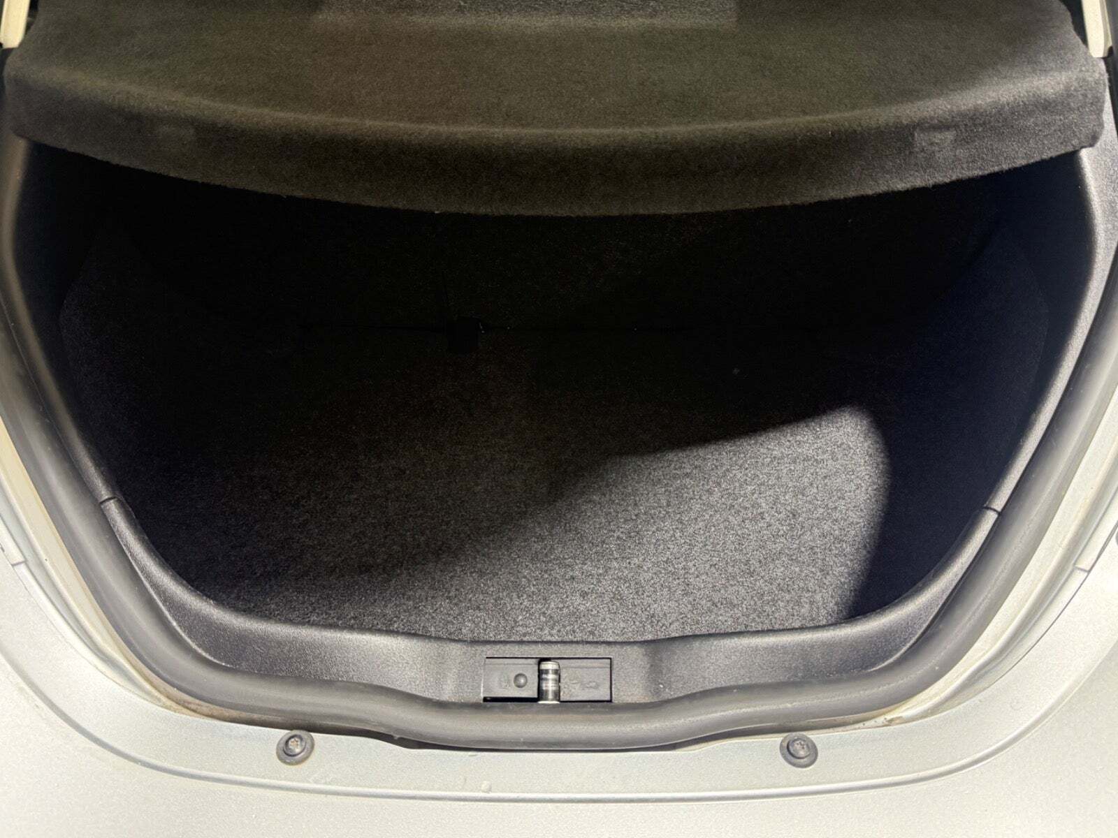 Sølv VW New Beetle fra 2009