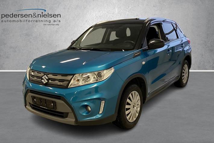 Grøn Suzuki Vitara fra 2015 set udefra