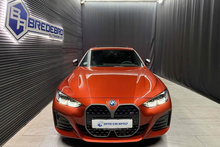 Orange BMW i4 fra 2024