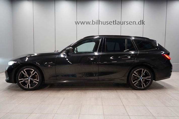 Sort BMW 330e fra 2023