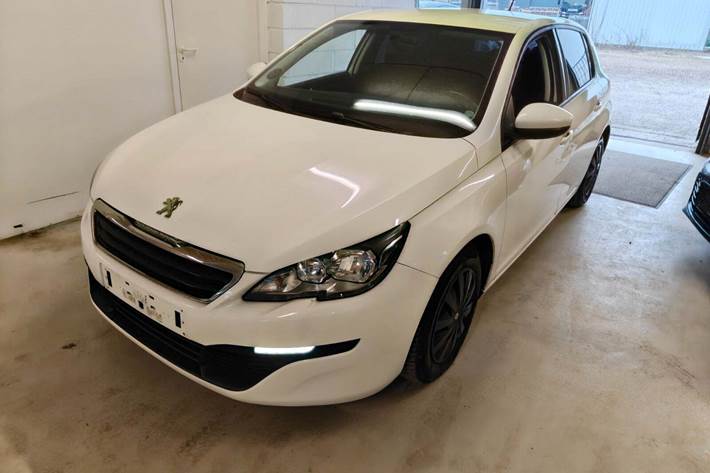 Gul Peugeot 308 fra 2014