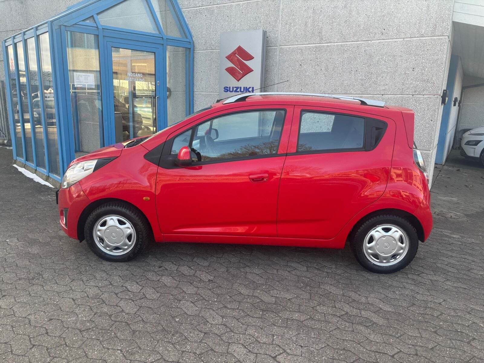 Rød Chevrolet Spark fra 2010