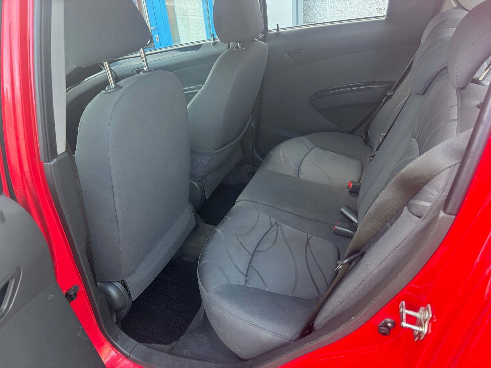 Rød Chevrolet Spark fra 2010