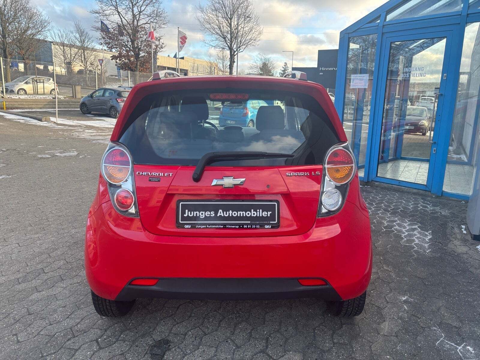 Rød Chevrolet Spark fra 2010