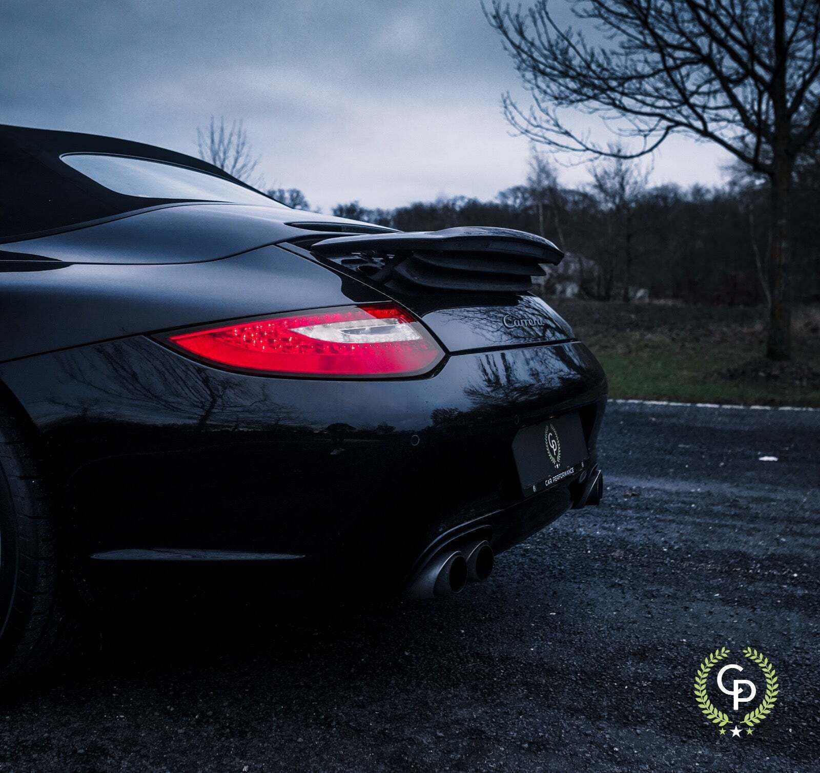 Sort Porsche 911 Carrera fra 2009