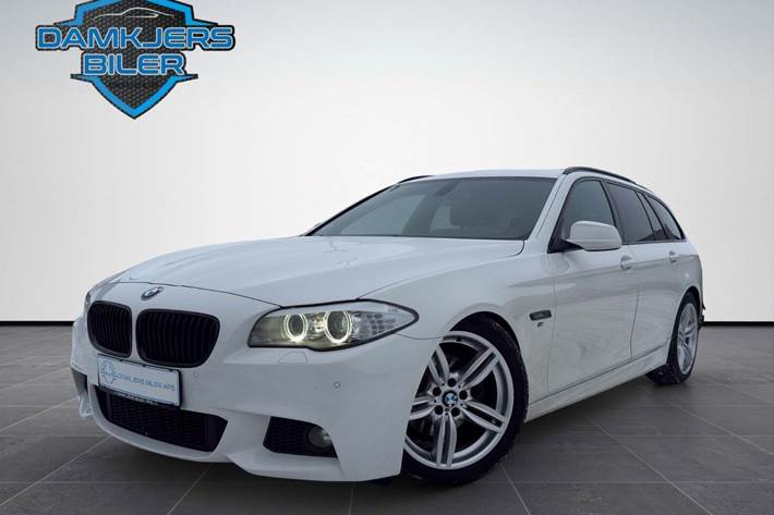 Hvid BMW 520d fra 2012 set udefra