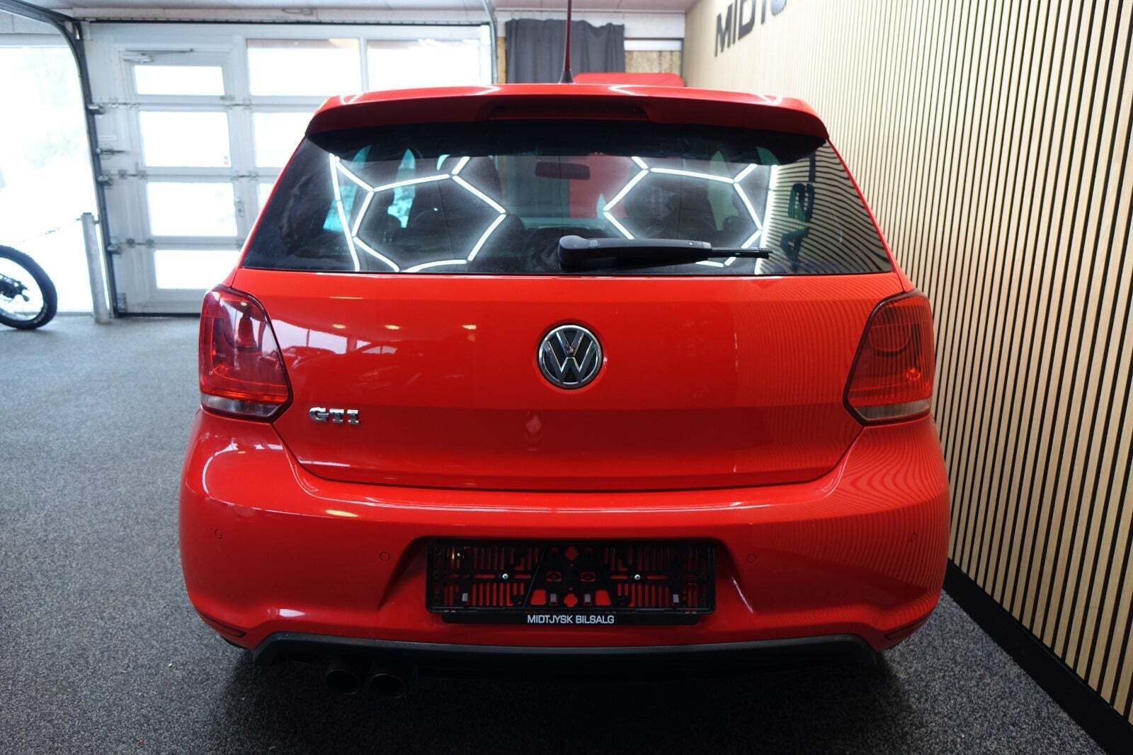 Rød VW Polo fra 2011