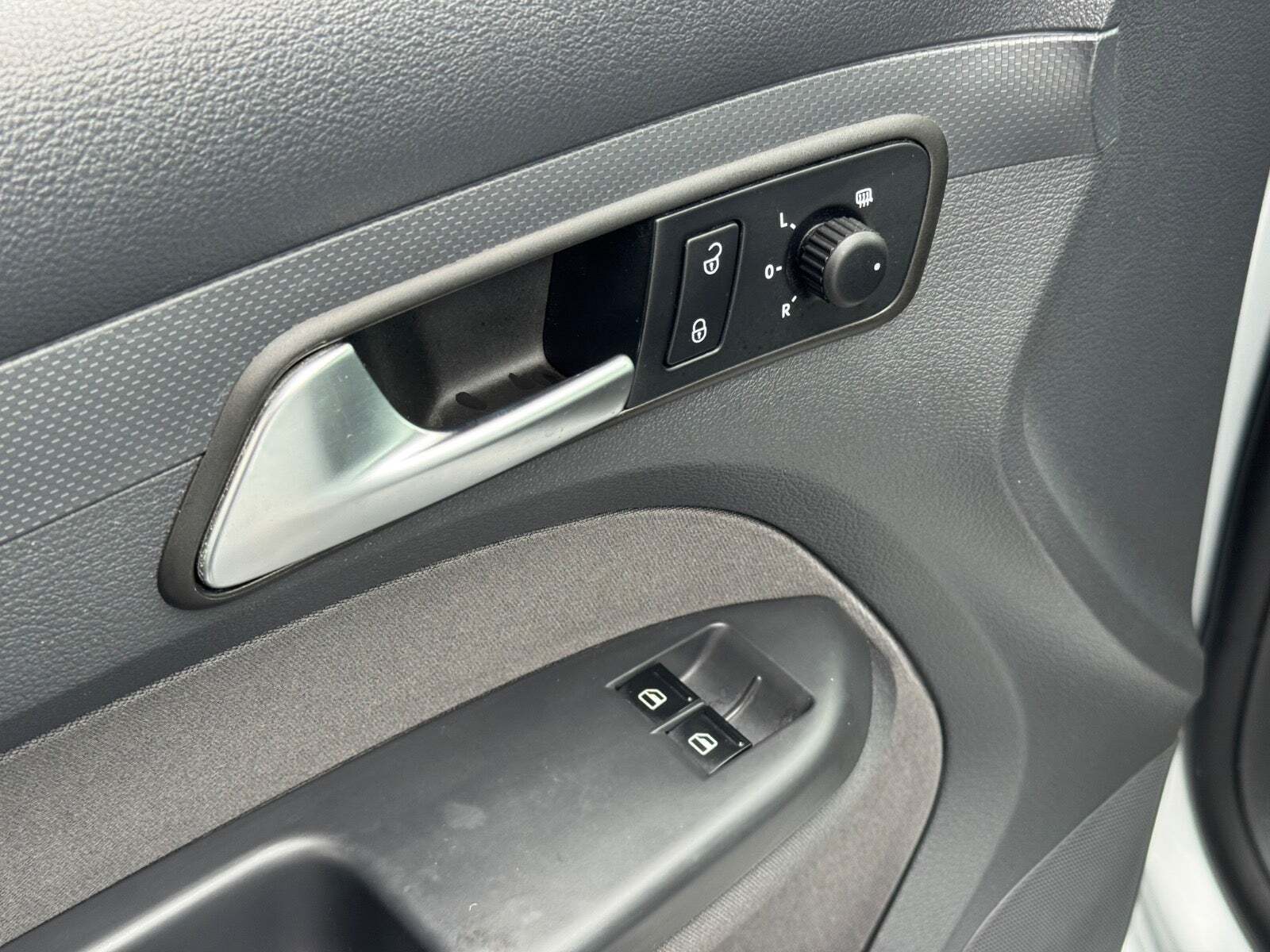 Sølv VW Caddy fra 2012