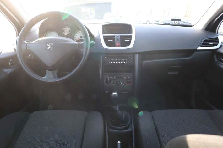 Orange Peugeot 207 fra 2009