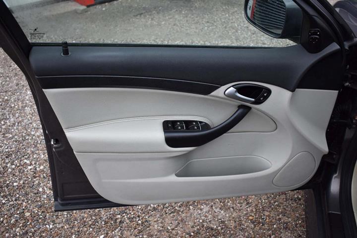 Grøn Saab 9-3 fra 2006