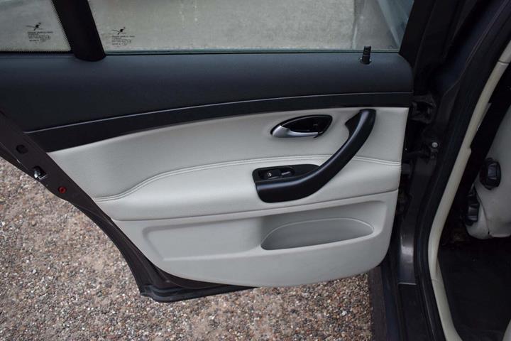 Grøn Saab 9-3 fra 2006