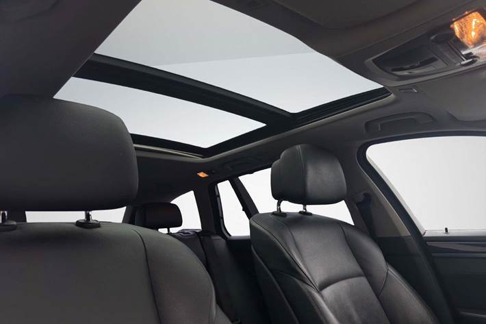 Grå BMW 520d fra 2010