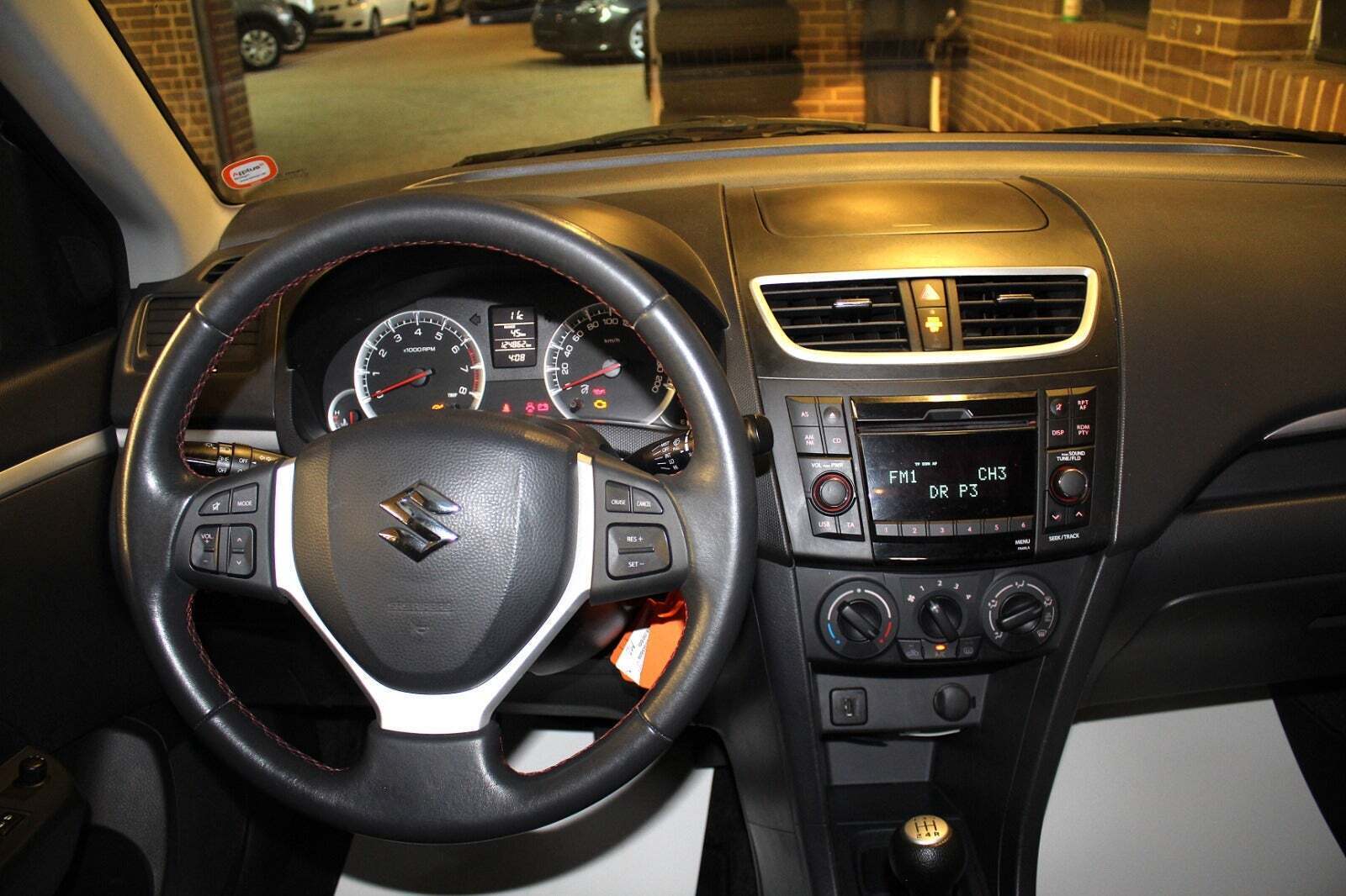 Brun Suzuki Swift fra 2014