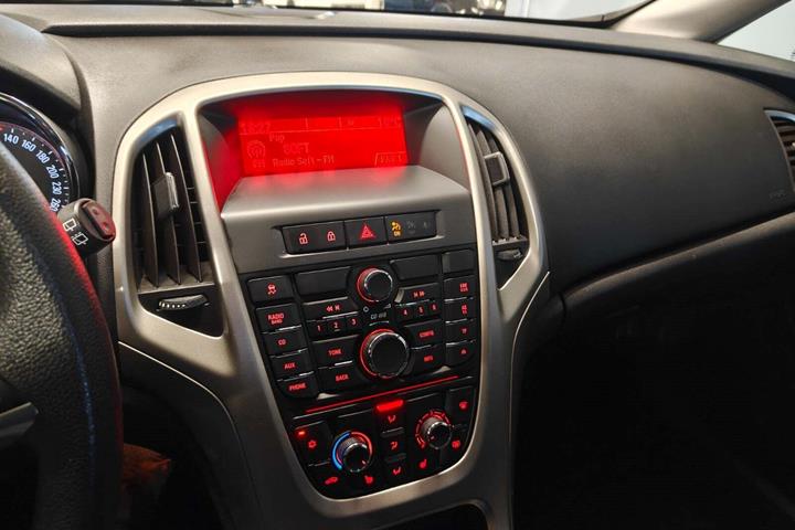 Gul Opel Astra fra 2011