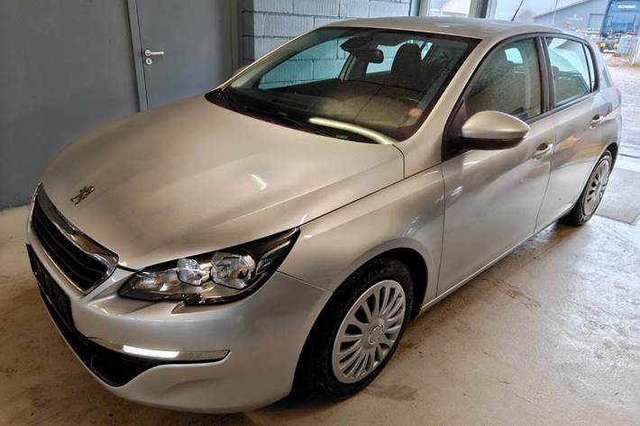 Gul Peugeot 308 fra 2014