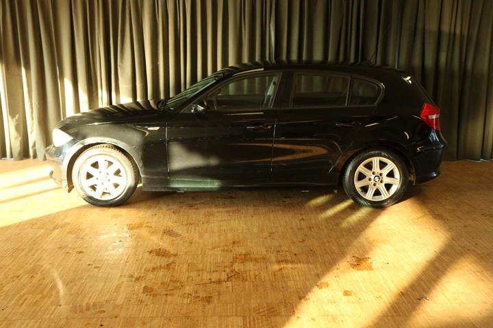 Grøn BMW 118i fra 2008