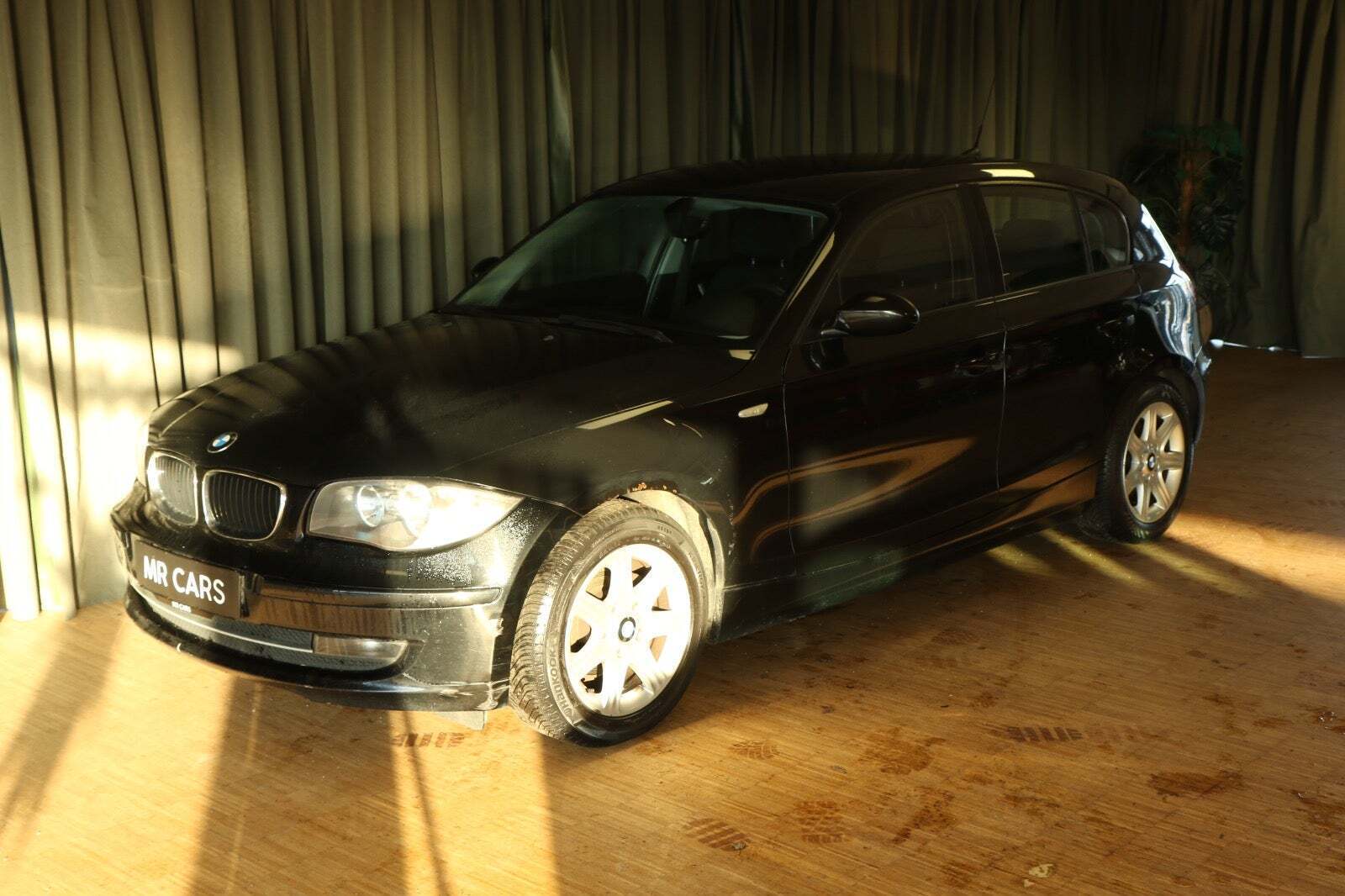 Grøn BMW 118i fra 2008