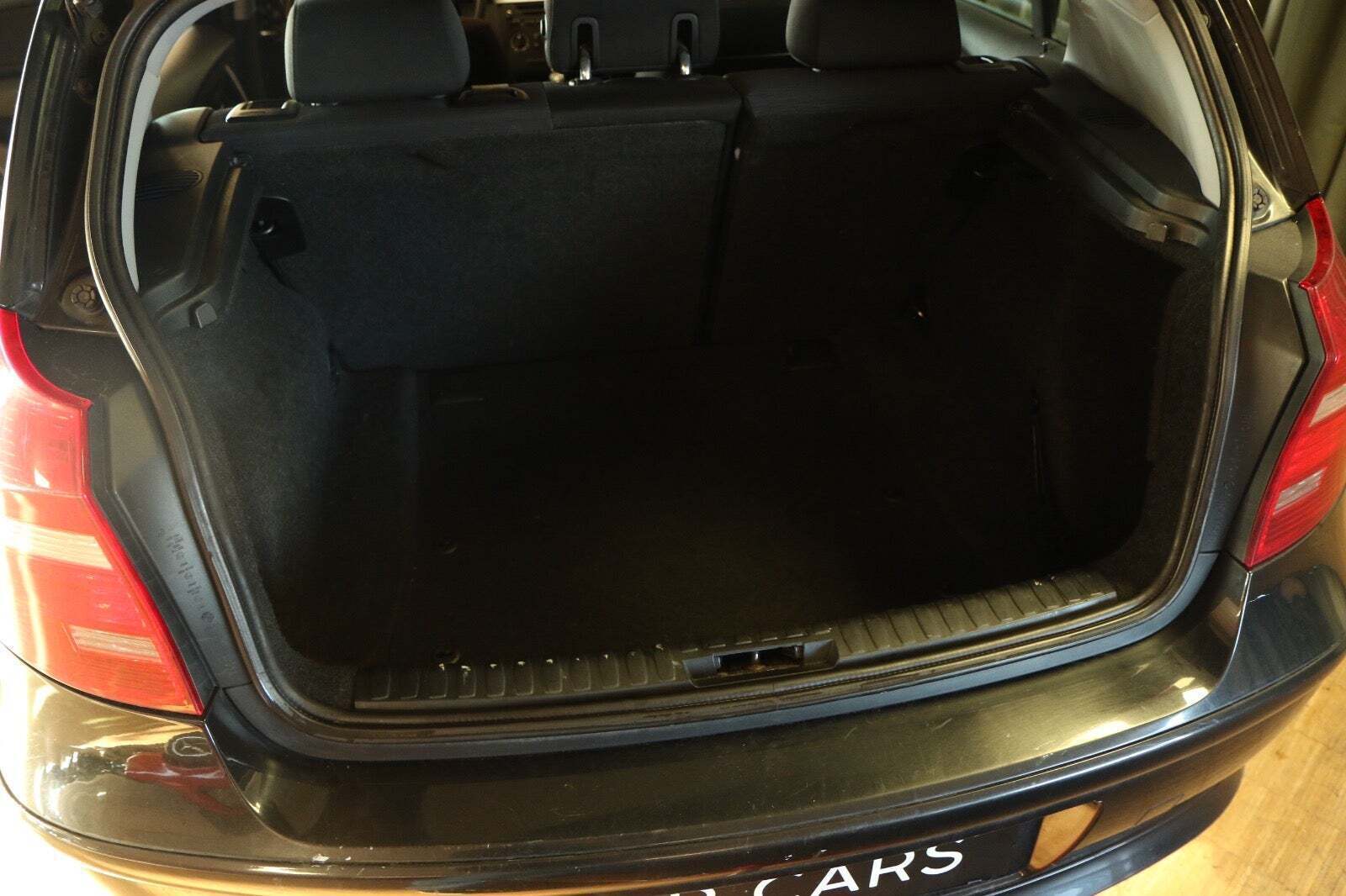 Grøn BMW 118i fra 2008