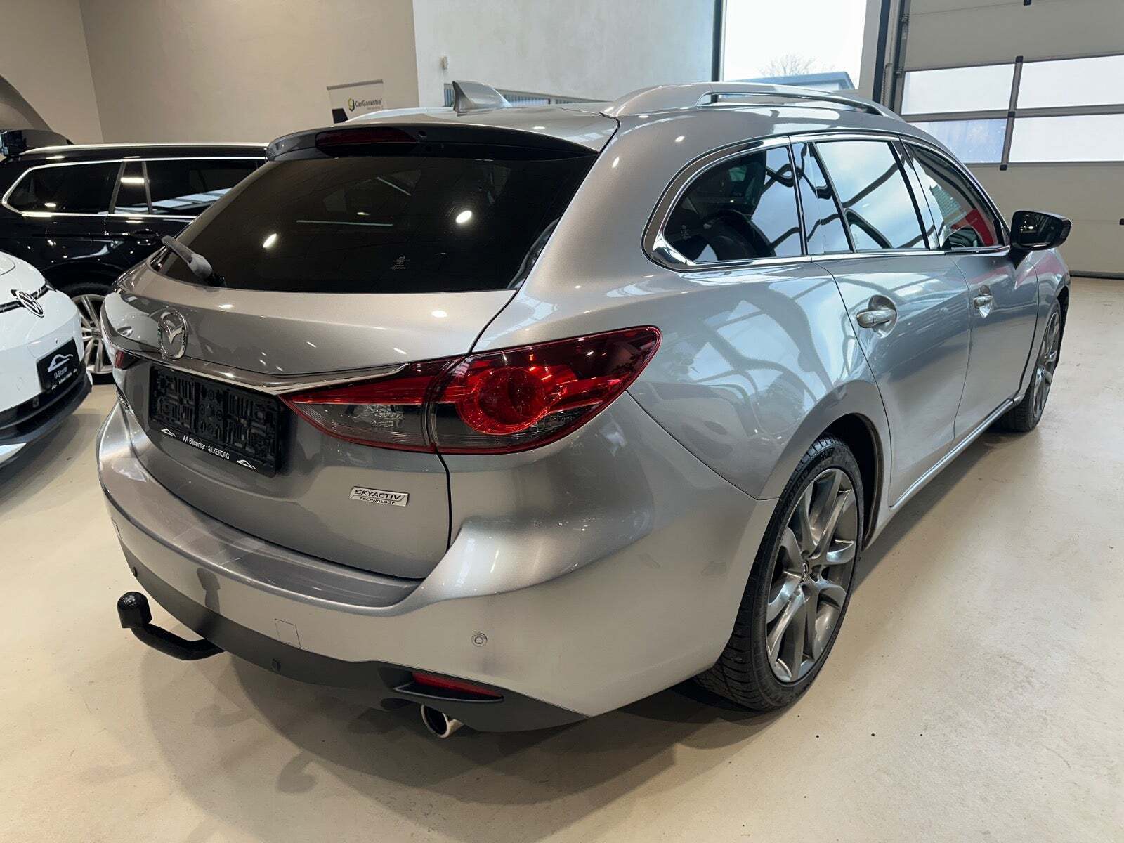 Grå Mazda 6 fra 2013
