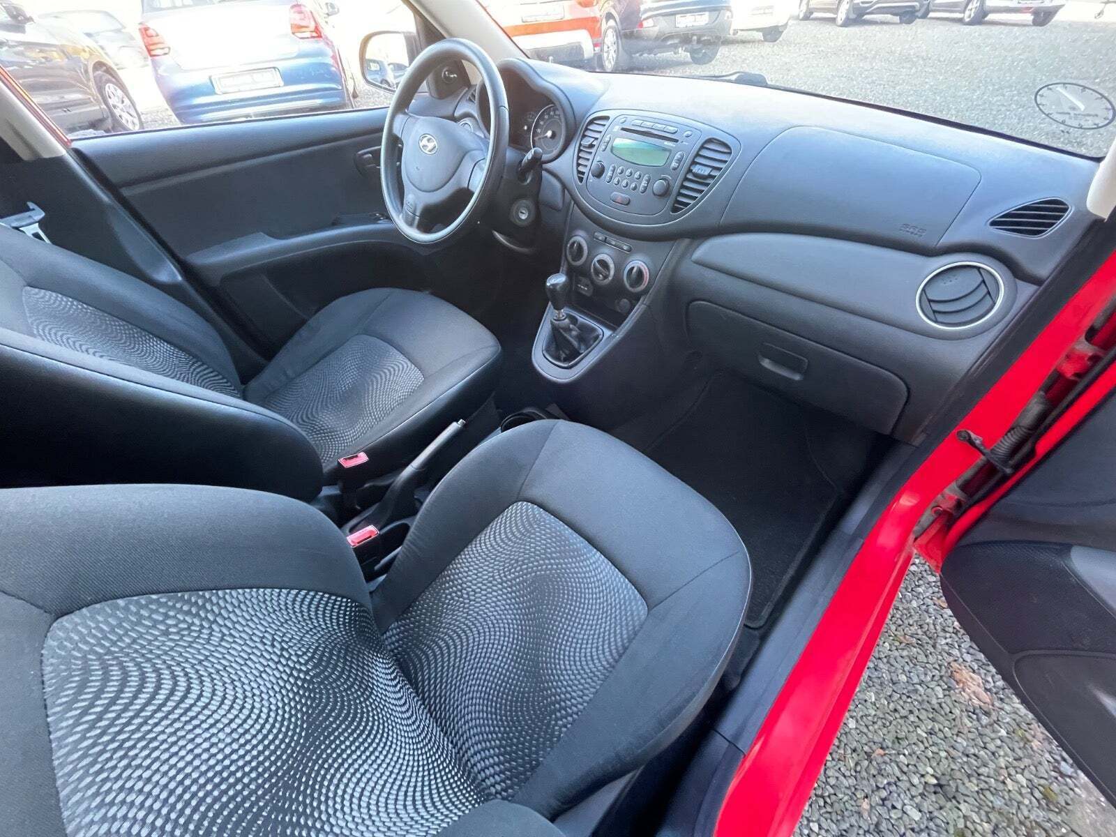 Rød Hyundai i10 fra 2013