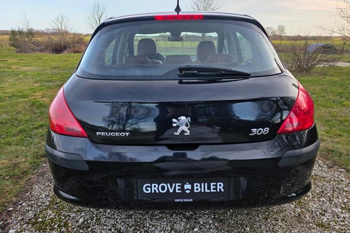 Brun Peugeot 308 fra 2009