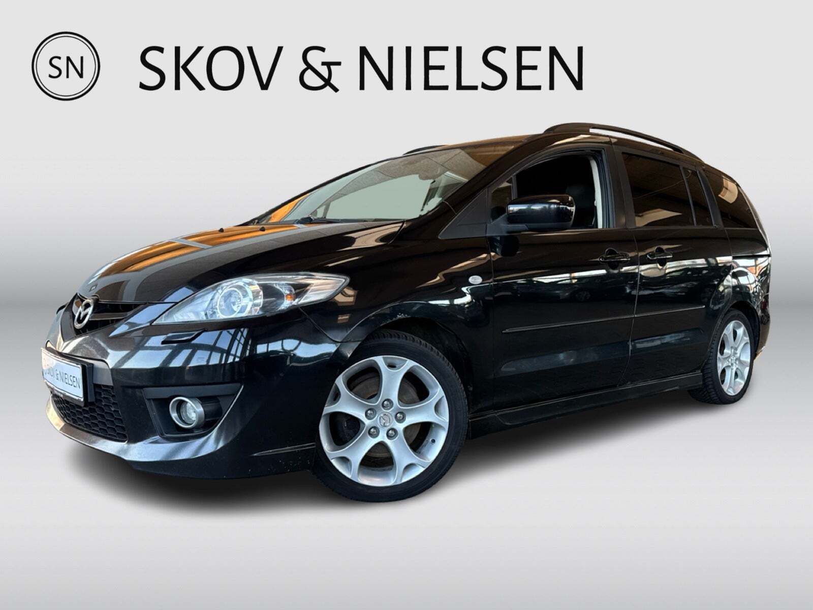 Sort Mazda 5 fra 2009 set udefra