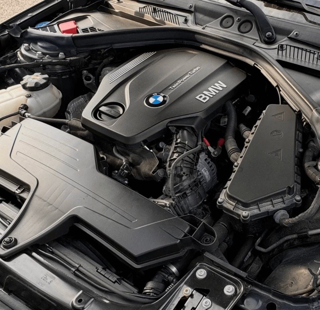 Grøn BMW 118d fra 2019