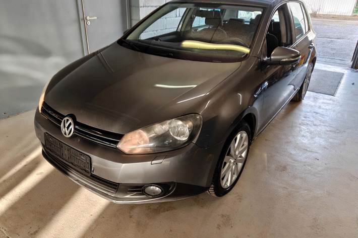 Gul VW Golf VI fra 2011