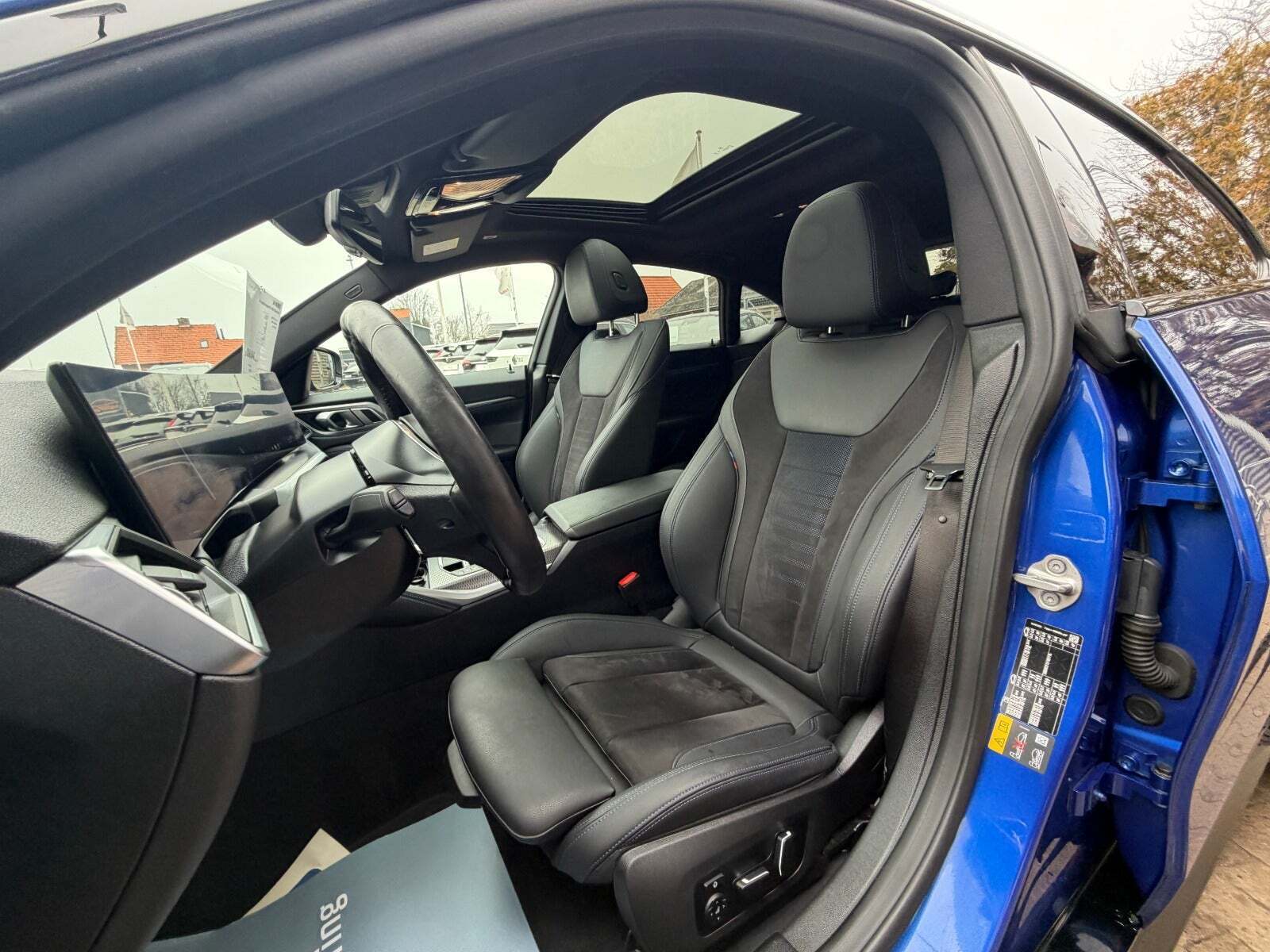 Blå BMW i4 fra 2023