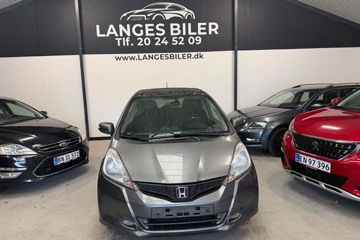 Grå Honda Jazz fra 2011