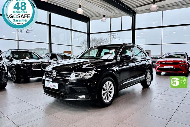 Gul VW Tiguan fra 2018 set udefra