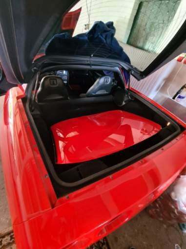 Rød Chevrolet Corvette fra 1998