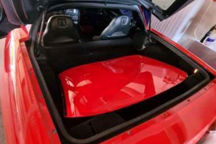 Rød Chevrolet Corvette fra 1998